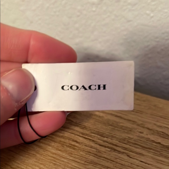 Coach Gold and White Bracelet. Has small crack in white paint on one side. - Picture 3 of 6